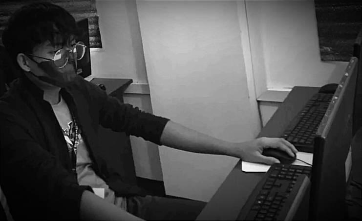 Beboy Eyana at work with a colleague